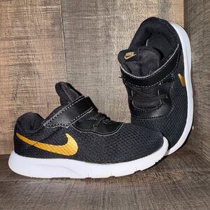 Nike Kids Black Sneakers with Gold Swoosh- size 8C